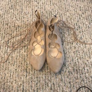 Nude lace up flats